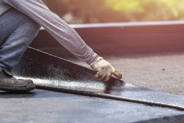 Professional Basement Waterproofing technician working in Grafton, OH